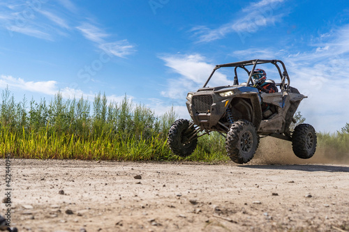 ATV adventure. Buggy extreme ride on dirt track. UTV photo