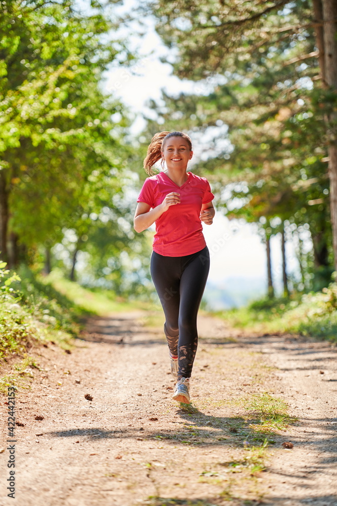 woman enjoying in a healthy lifestyle while jogging woman enjoying in a healthy lifestyle while jogging