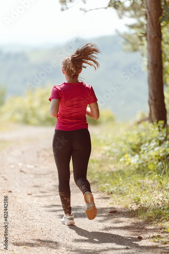woman enjoying in a healthy lifestyle while jogging