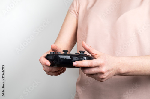 Woman with game console. Recreation and entertainment