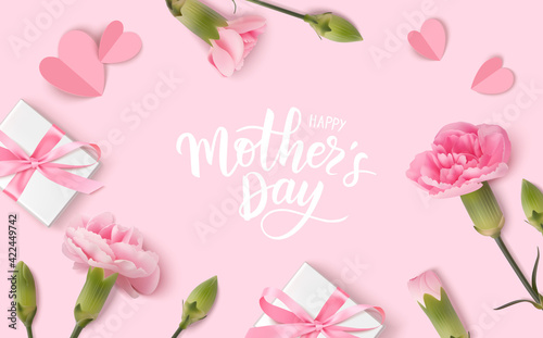 Happy Mothers day. Calligraphic greeting text. Holiday design template with realistic pink carnation flowers, gift boxes and paper hearts on pink background. Vector stock illustration.