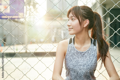outdoor portrait of an asian athletic girl