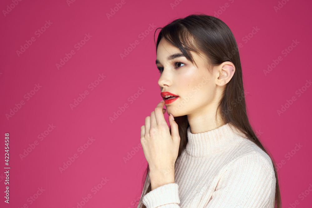 Cute brunette red lips glamor cosmetics pink background Cute brunette red lips glamor cosmetics pink background