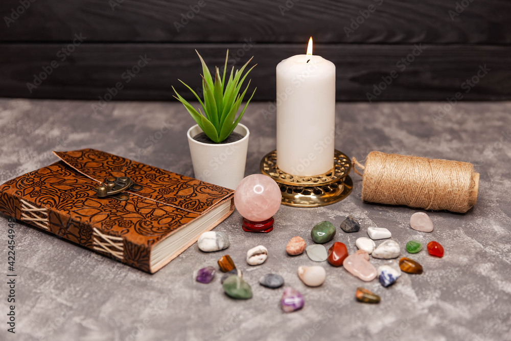 The crystals are arranged in a sacred meditation mandala. Crystal ball surrounded by healing crystals. Minerals crystals and semi precious stones. Healing chakra crystals. Ceremony. The crystals are arranged in a sacred meditation mandala. Crystal ball surrounded by healing crystals. Minerals crystals and semi precious stones. Healing chakra crystals. Ceremony.