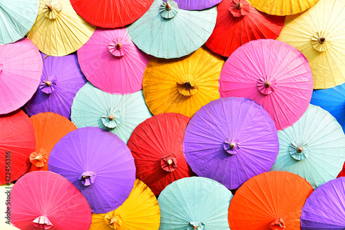 Full frame umbrellas are vary colorful background.