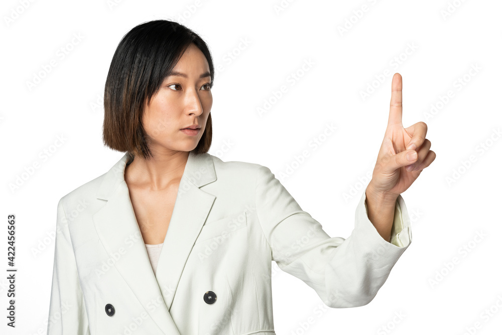 Asian businesswoman touching virtual screen Asian businesswoman touching virtual screen