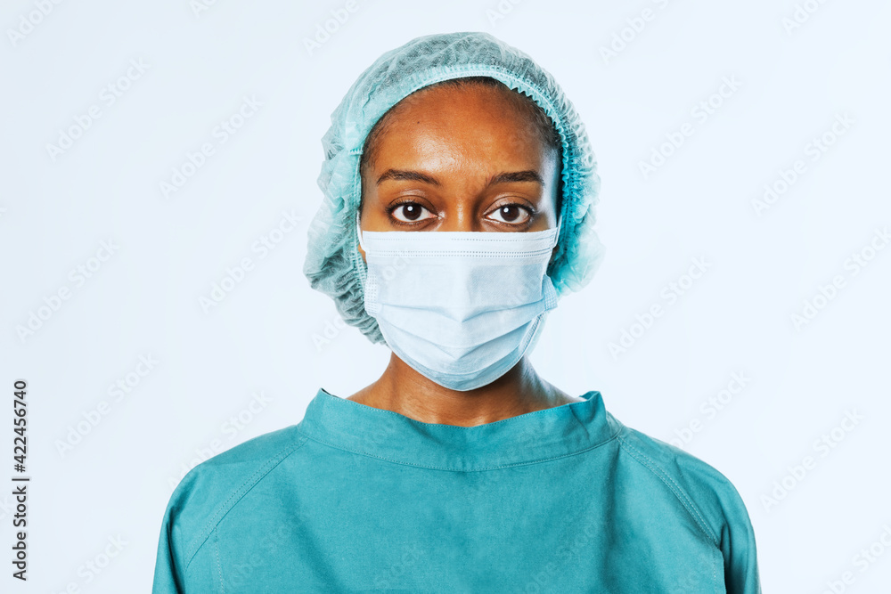 Female doctor wearing surgical mask Female doctor wearing surgical mask