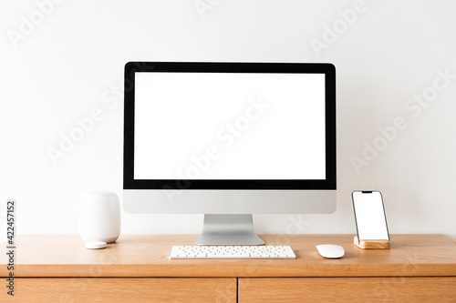 Blank computer screen on a table