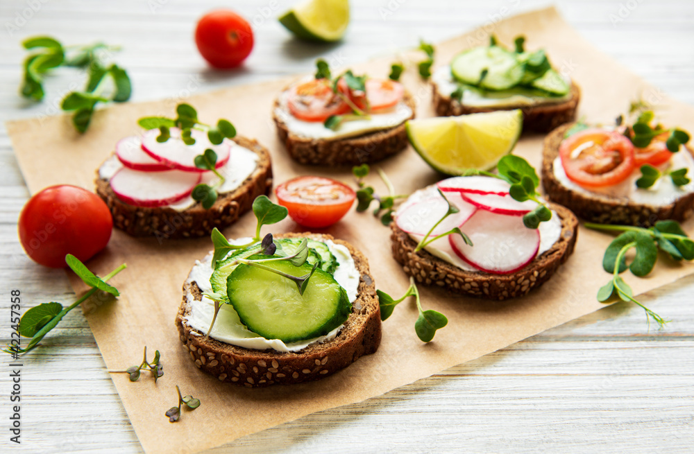 Sandwiches with healthy vegetables and micro greens Sandwiches with healthy vegetables and micro greens