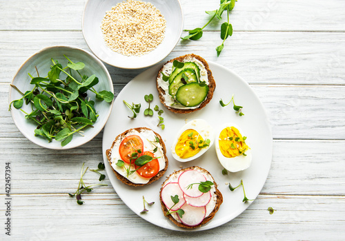Sandwiches with healthy vegetables and micro greens