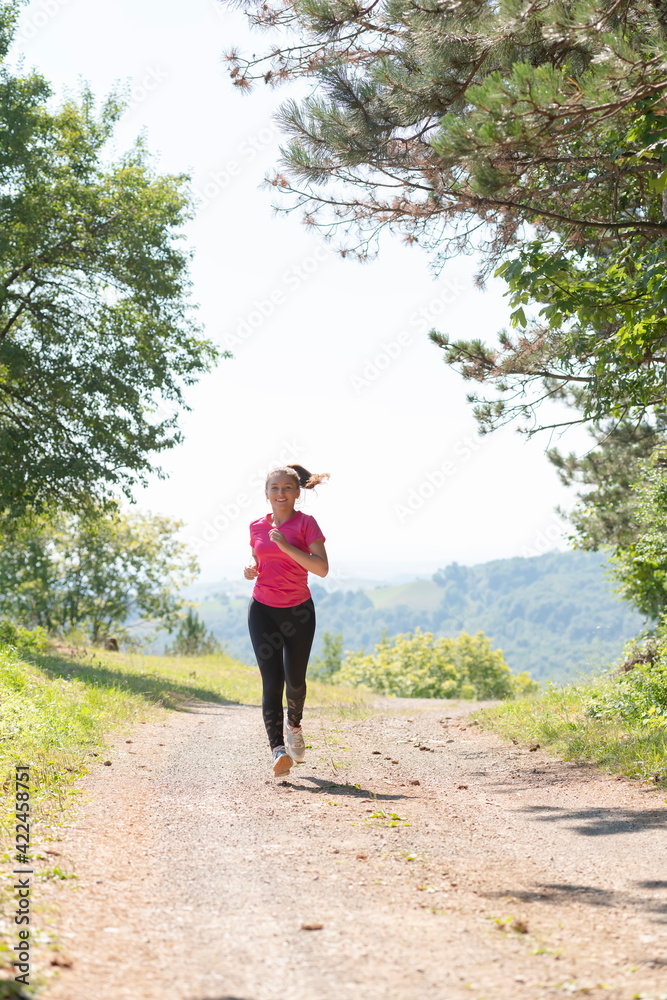 woman enjoying in a healthy lifestyle while jogging woman enjoying in a healthy lifestyle while jogging