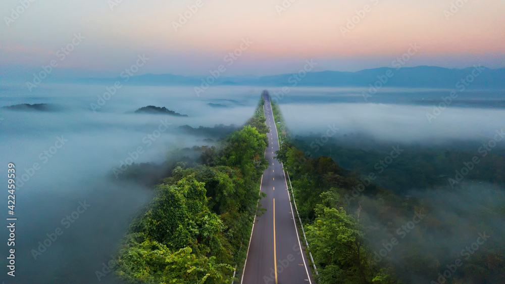 sky road over top of mountains with green jungle in Nan province, Thailand
