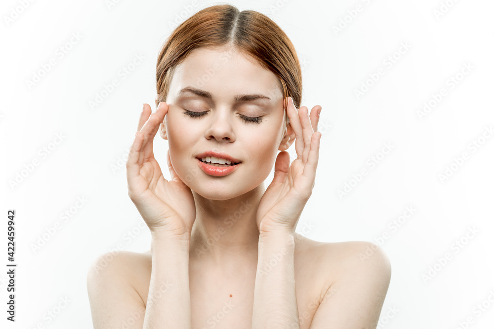 Fototapeta premium woman holding glamor face attractive look naked shoulders closed eyes
