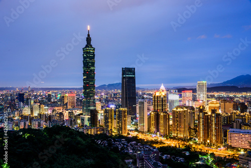 Night view of Taipei Xinyi Financial District from the top of the Xiangshan mountain in Taipei Taiwan. © BINGJHEN
