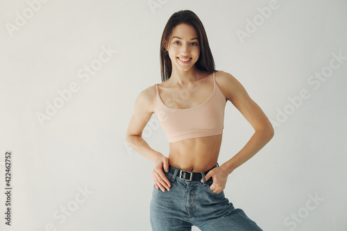 Fashion girl posing in a photo studio