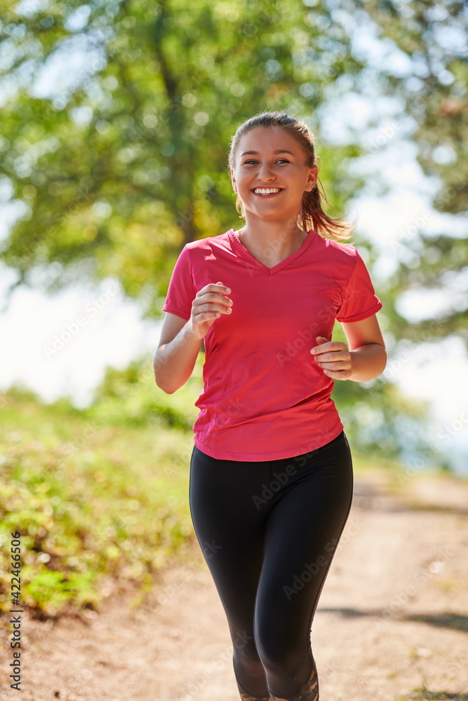 woman enjoying in a healthy lifestyle while jogging woman enjoying in a healthy lifestyle while jogging