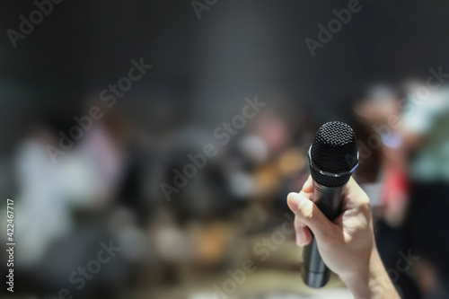 Close up of Hand holding microphone 