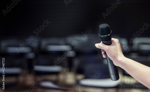 Close up of Hand holding microphone  © ifriday