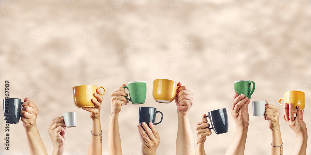 Mockup of woman's and man's hands holding different cups of coffee Mockup of woman's and man's hands holding different cups of coffee