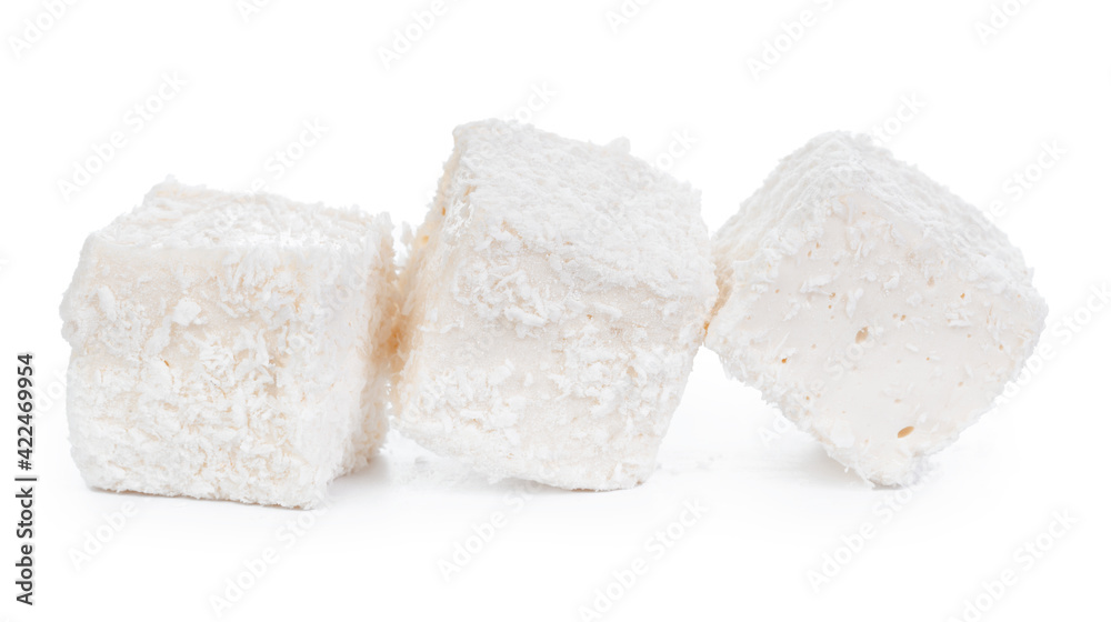 White Turkish delight with coconut shavings isolated on white White Turkish delight with coconut shavings isolated on white