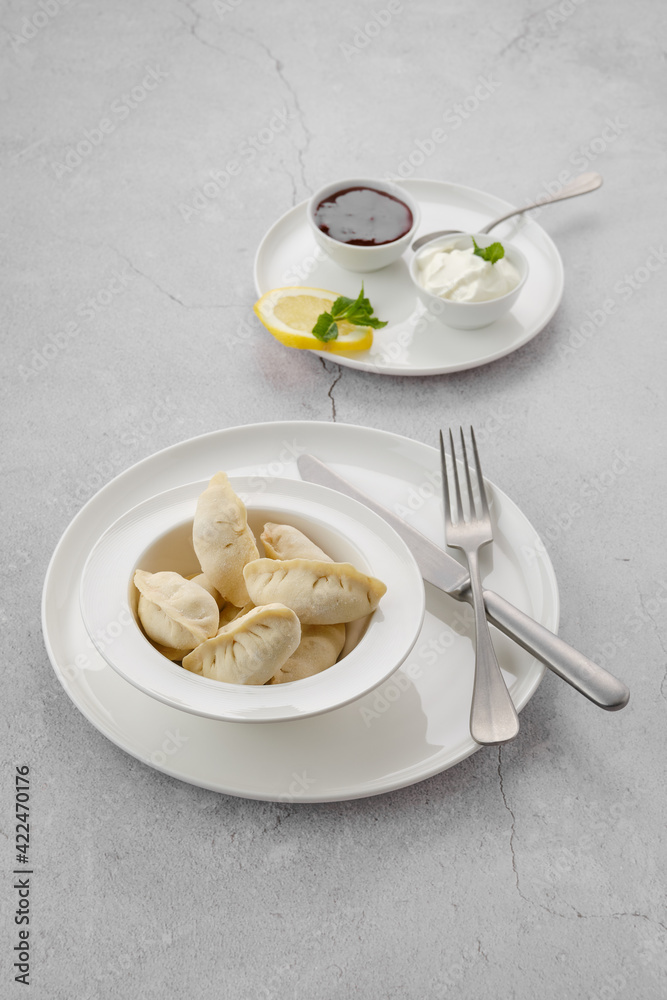 Frozen semifinished vareniki stuffed with strawberry