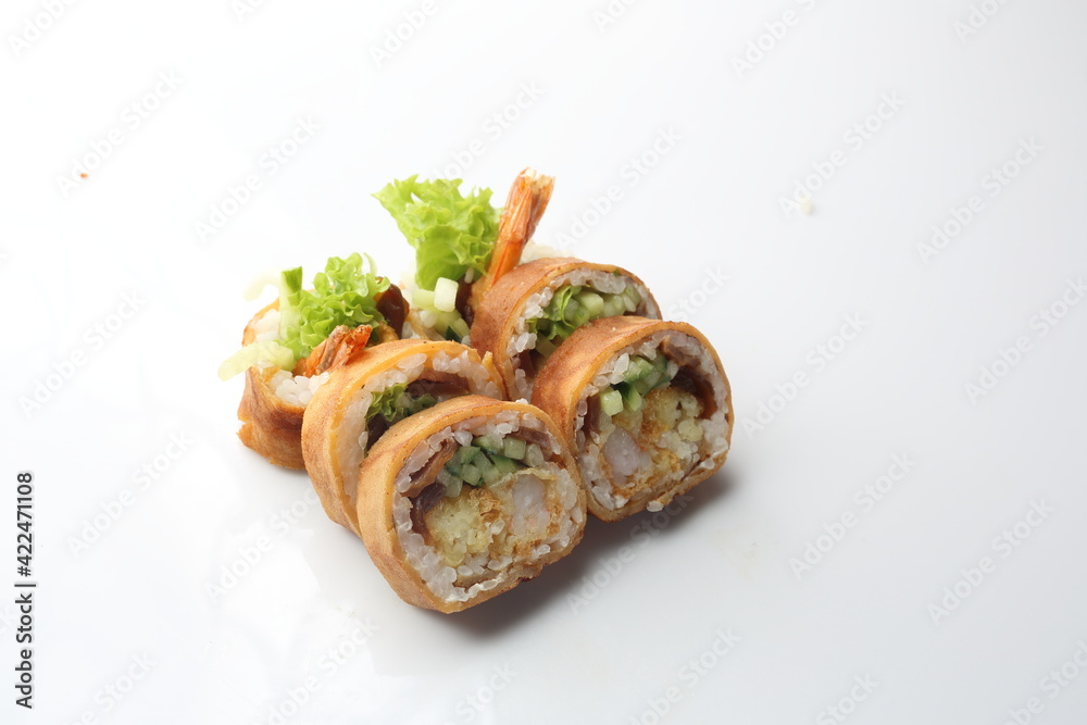 6 piece sushi set. Tempura maki rolls with shrimp, cucumber and pickled radish, isolated on a white background. Japanese cuisine delicacy. A packshot photo.