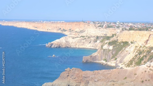 Beautiful view of the coast of the turquoise sea and mountains at Cape Fiolent, Crimea. The concept of tranquility, silence and unity with nature.