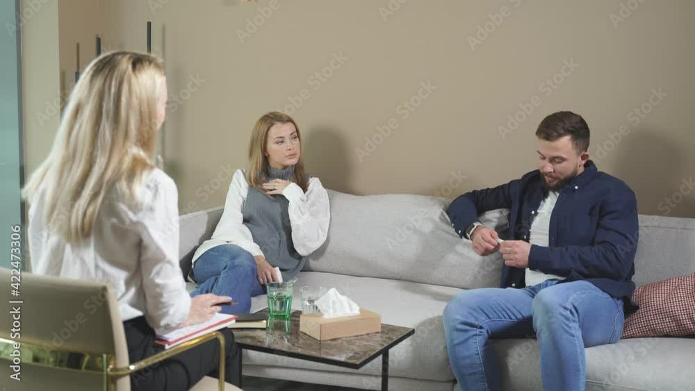 Married couple don't want to be divorced, get help by professional during psychological therapy session. Married couple don't want to be divorced, get help by professional during psychological therapy session.
