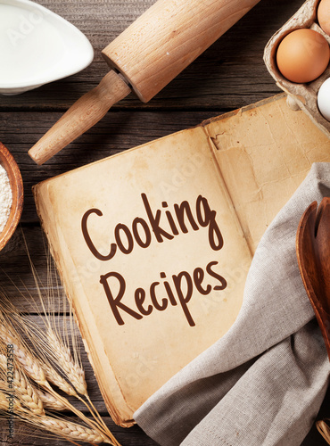Vintage recipe book, utensils and ingredients