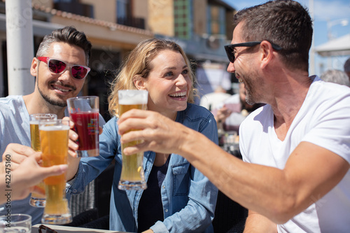 group of happy friends having party