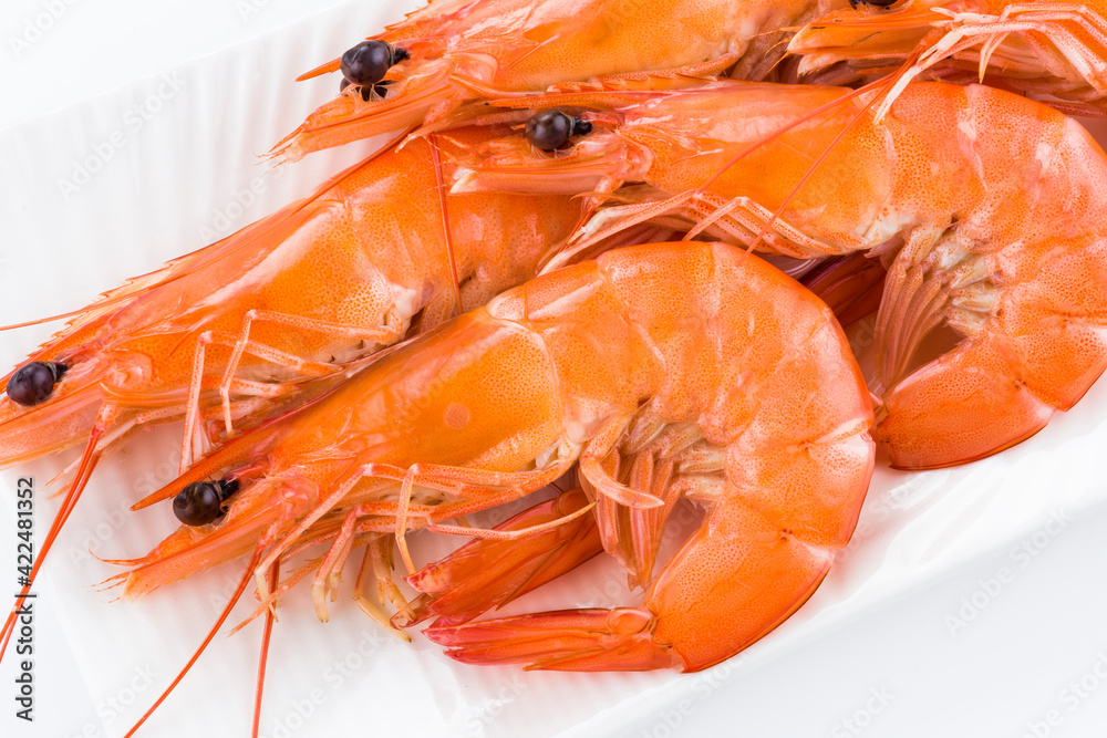 Close-up of fresh boiled shrimp isolated on white background Close-up of fresh boiled shrimp isolated on white background