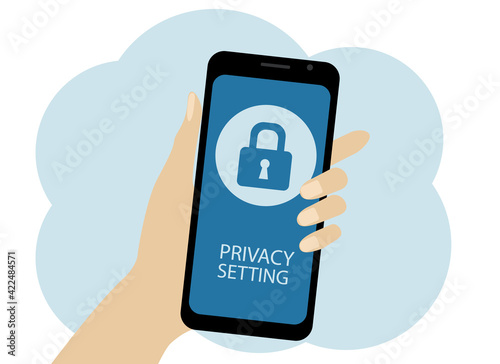 Hand with a mobile phone. The phone has a lock with the privacy settings text