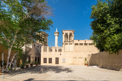 Traditional Arabic street in Bastakiya, Dubai photo