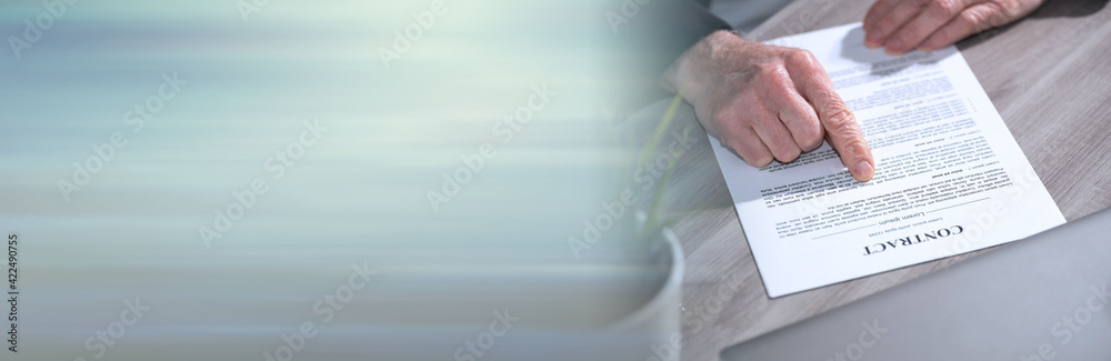 Naklejka premium Male hands checking contract; panoramic banner
