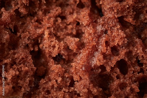 Food background half a chocolate cupcake, selective focus, close up