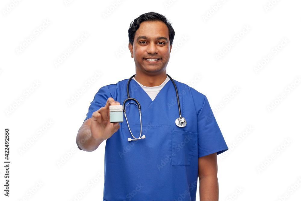 indian doctor or male nurse holding medicine