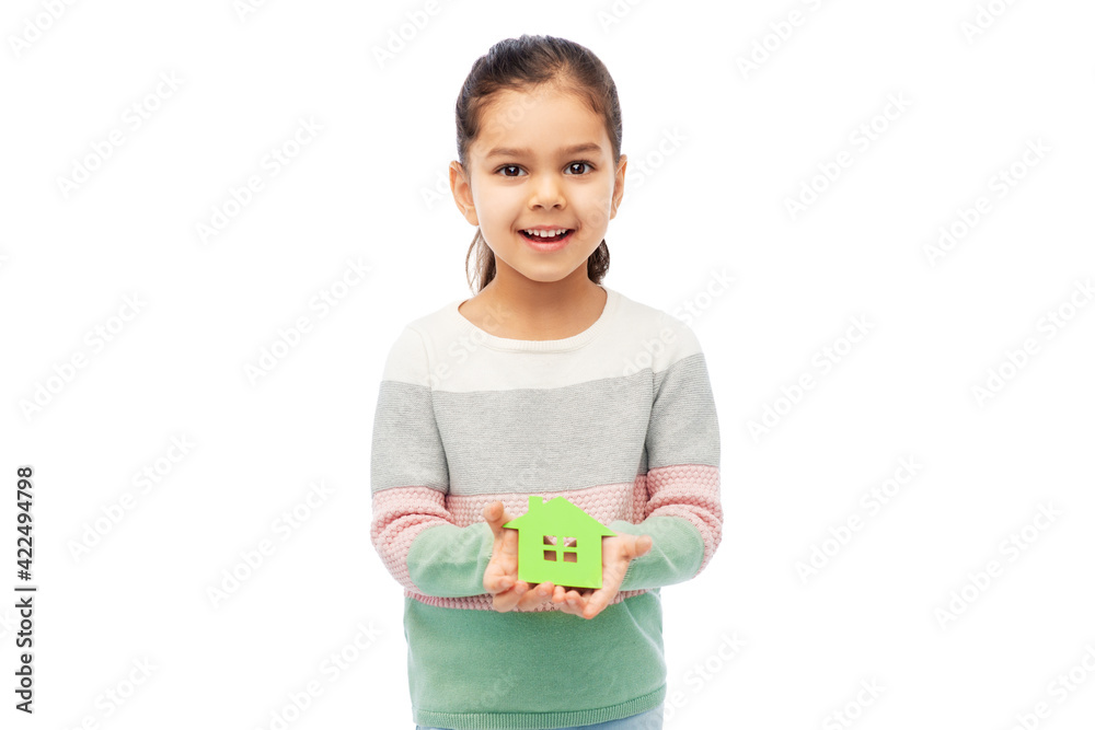 smiling little girl holding green house icon smiling little girl holding green house icon