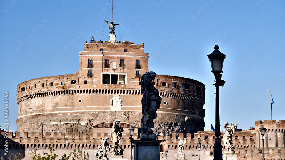 Charming panoramic view on the ancient Castel and Ponte Sant'Angelo ( Famous Roman landmarks).Scenic architectural and natural landscape at sunny day. Embankment of the river Tiber. Rome.Italy.Europe.