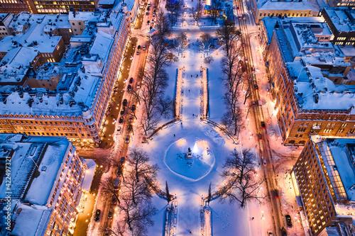 Aerial view of Esplanade park with Christmas decoration. Aerial view of snow-covered Helsinki, Finland.