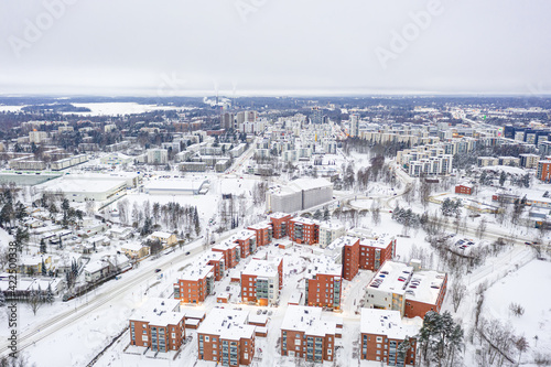 Aerial view of Matinkyla neighborhood of Espoo, Finland. Snow-covered city in winter. photo