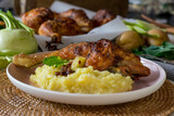 grilled chicken with potato kohlrabi puree on a plate