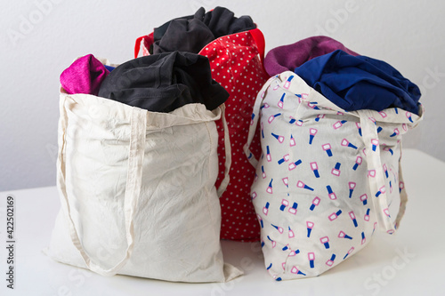 Reusable coth bags filled with used clothing
