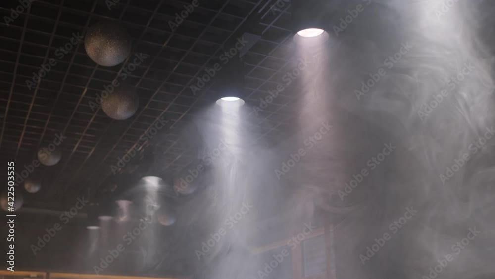Lamps of light with a cloud of smoke. Close-up. Lamps of light with a cloud of smoke. Close-up.