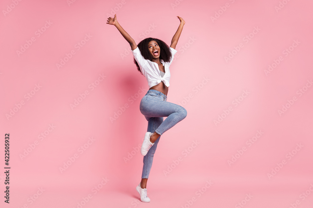 Full size profile photo of nice hooray brunette hairdo lady stand wear white shirt jeans isolated on pink color background