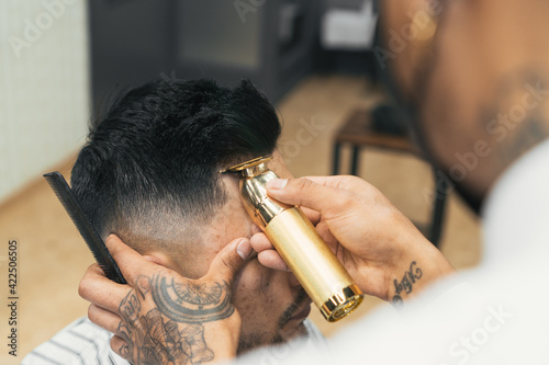 Hairdressing and barbershop, artistic and youthful cutting styles.