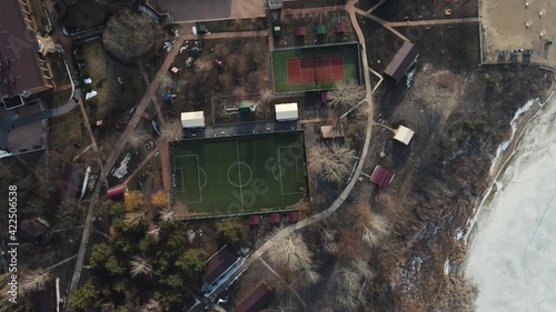a park with a football field. aerial shooting