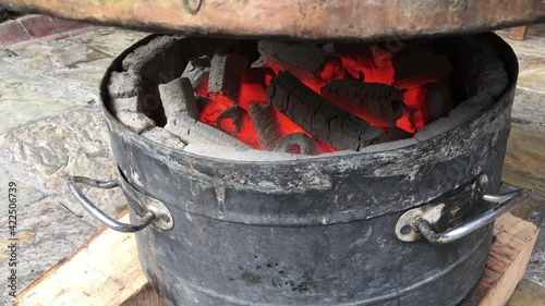 cauldron on open fire, cauldron over wood fire, Boiling cauldron over fire in Turkey