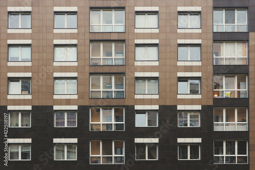 Windows residential high-rise buildings. Abstract urban background.