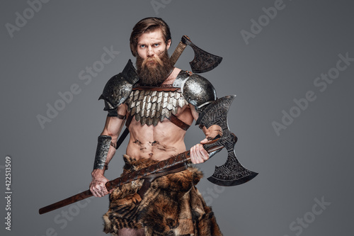 Wallpaper Mural Martial muscular man from netherlands posing with an axe