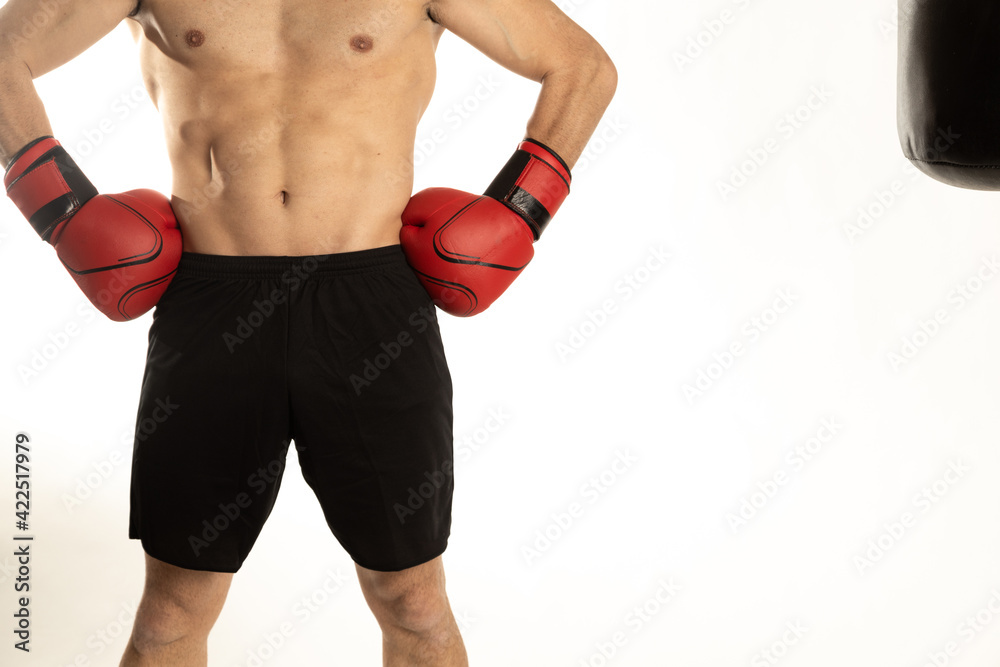 Athlete man training with boxing gloves on white background. Athlete man training with boxing gloves on white background.